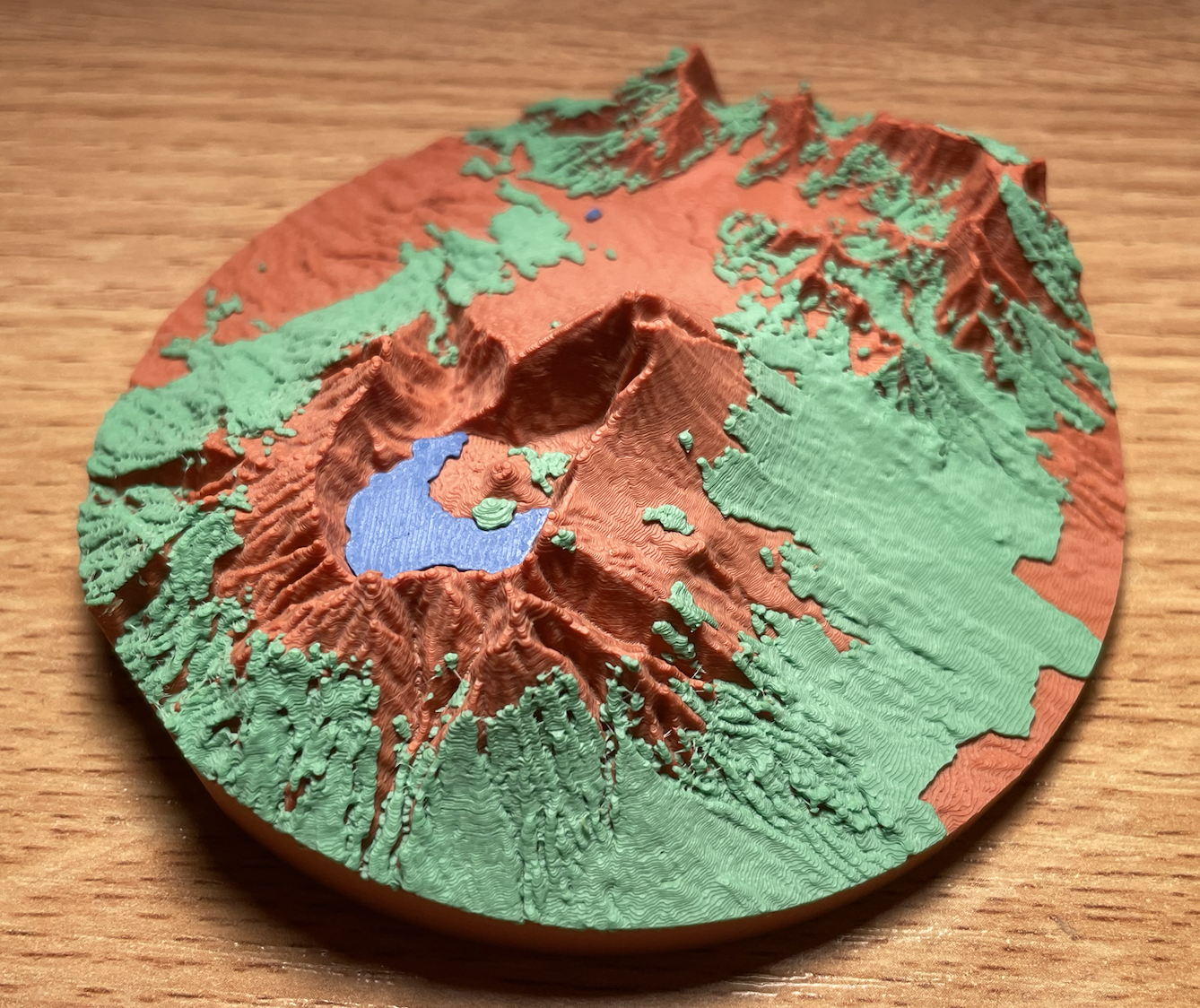 Mount Rinjani, printed in three colours from topogmesh, with the crater lake taken from OpenStreetMap