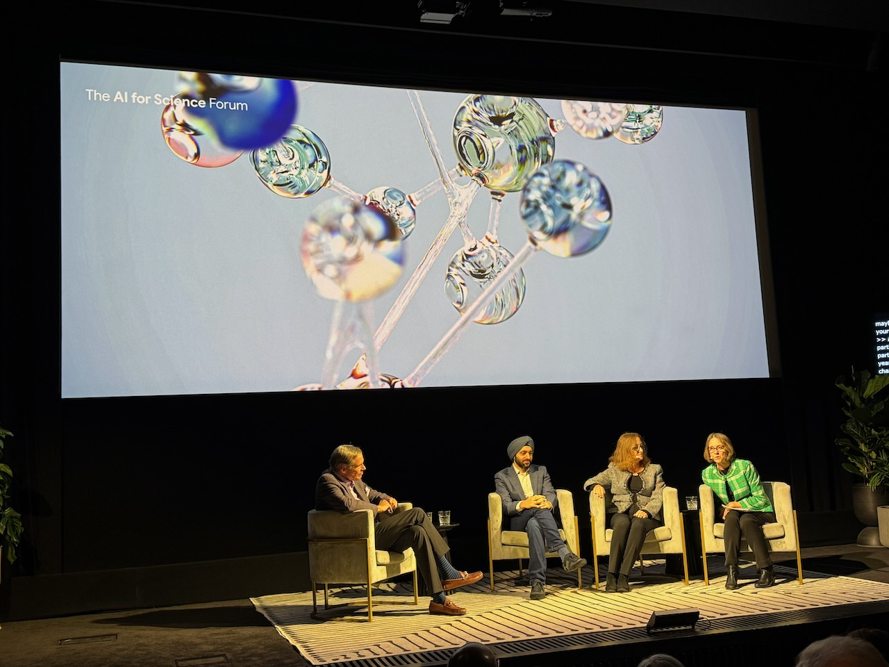 Eric, Pushmeet, Fiona and Alison on stage.