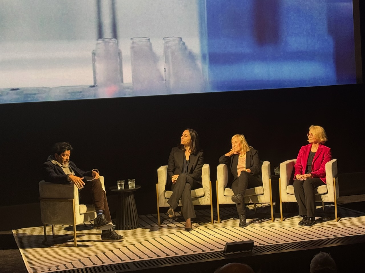 Siddhartha on stage with Anne, Janet and Anna.