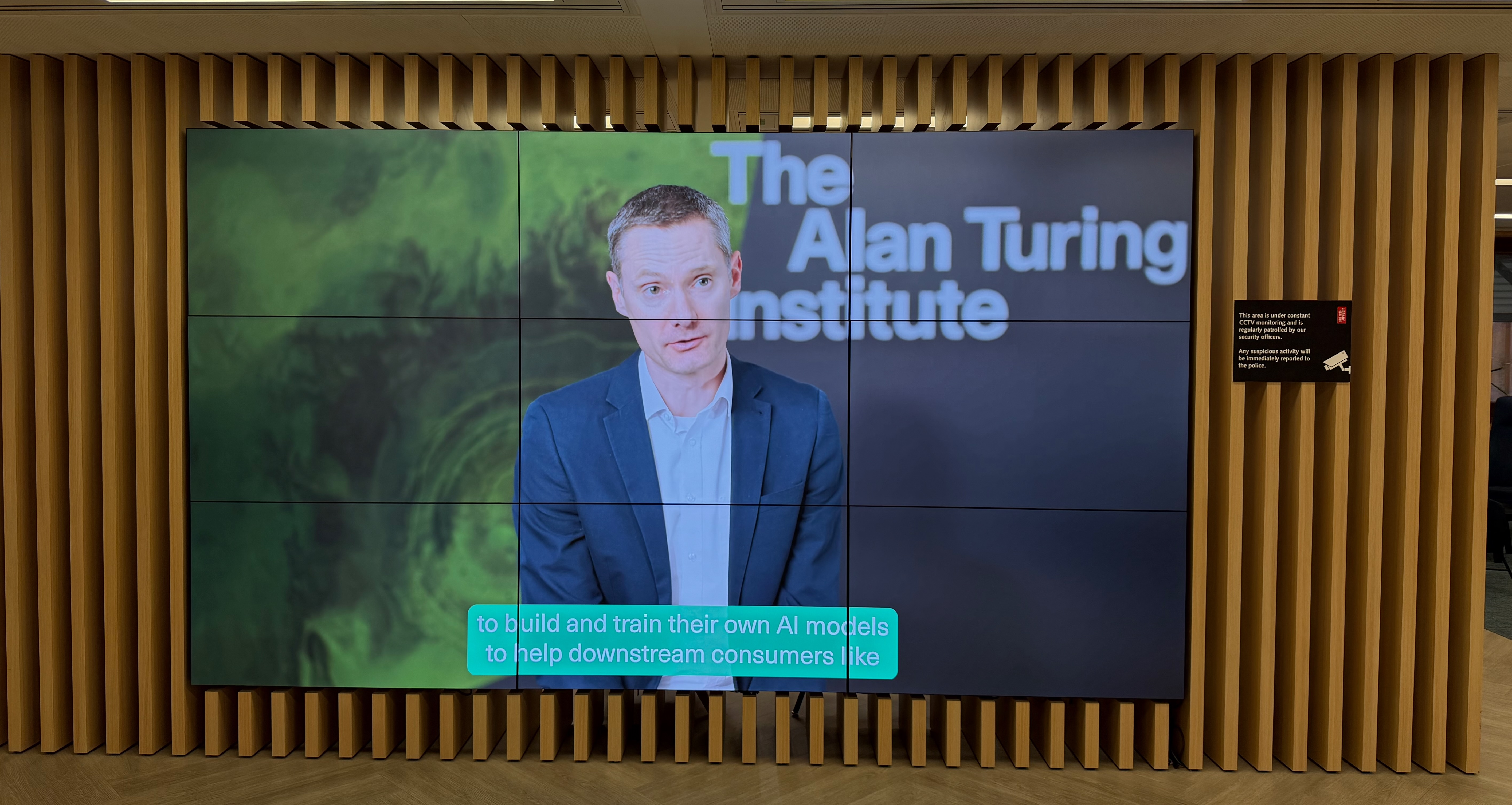 There is a giant Rich Turner explaining weather forecasting at the front entrance to the ATI. Yay Rich!